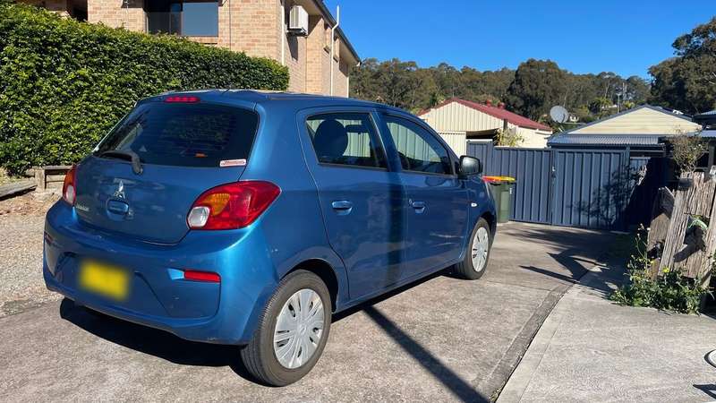 Blue Mitsubishi Mirage available for weekly rental from Plenum in Newcastle